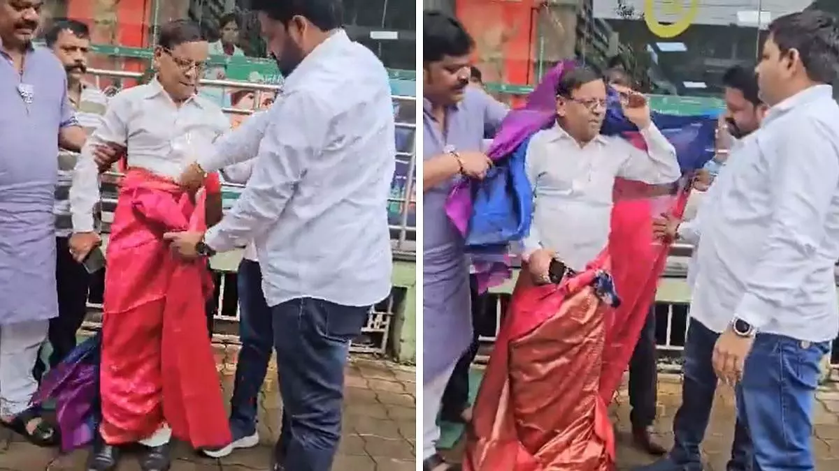 Congress Worker Posts Morphed Photo Of PM, BJP Workers Force Him To Wear Saree