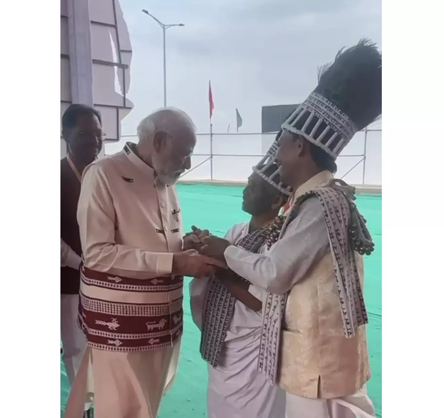 Modi Breaks Protocol to Honour Ramnami Tribe Delegation’s Wish to Adorn Him With Tribal Headgear